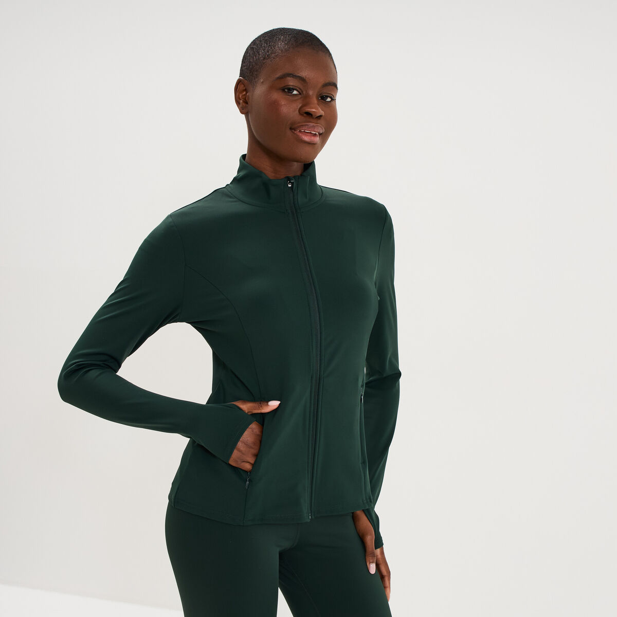 Veste de sport ajust&eacute;e avec fermeture vert fonc&eacute; femme