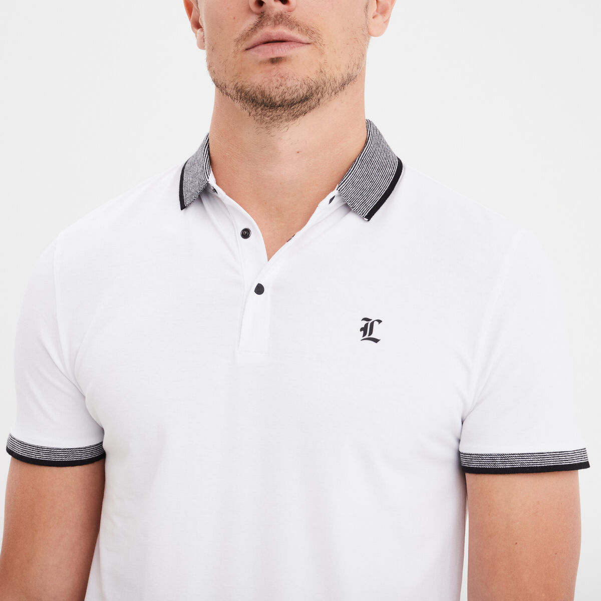 Polo coton stretch droit manches courtes blanc homme