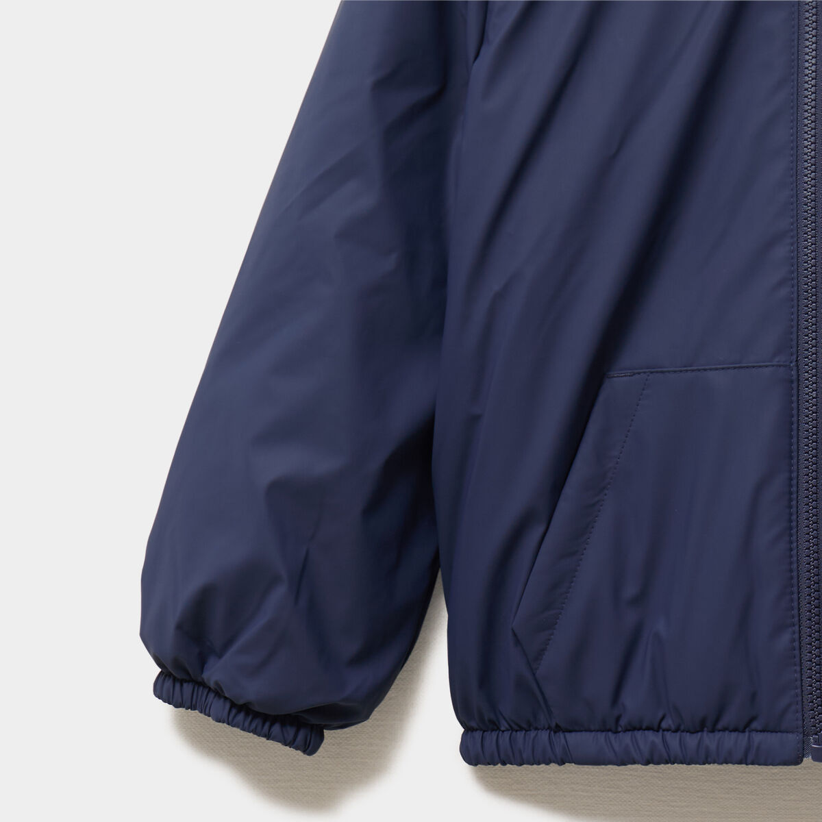 Blouson d&eacute;perlant r&eacute;versible &agrave; capuche marron fonc&eacute; gar&ccedil;on