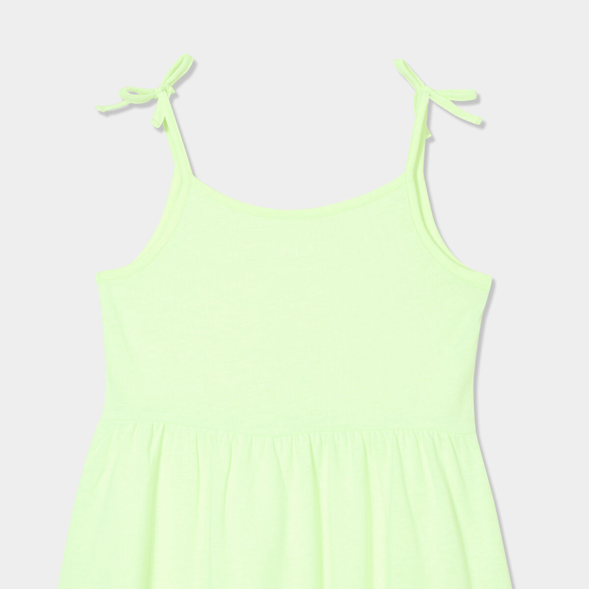 Robe courte bretelles nou&eacute;es &eacute;vas&eacute;e jaune fluo fille