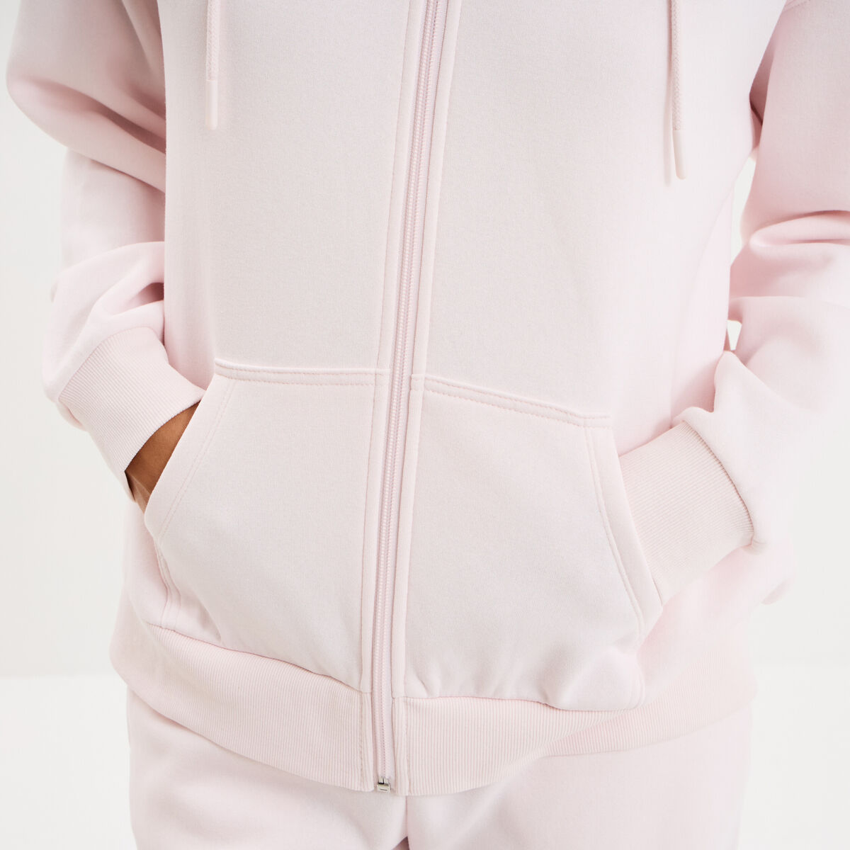 Sweat zipp&eacute; &agrave; capuche molleton rose clair femme