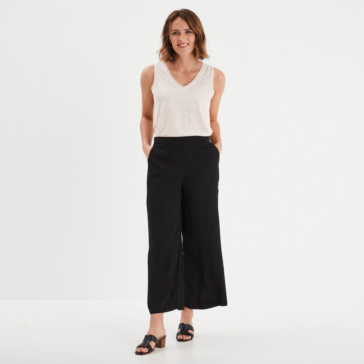 Débardeur col en V sans manches rose clair femme