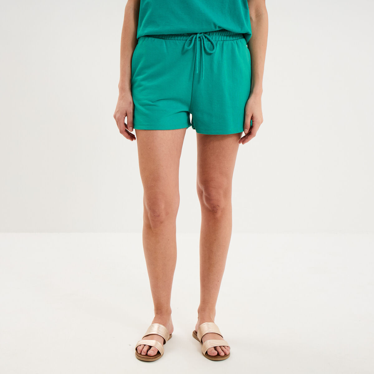 Short de jogging molletonn&eacute; ajust&eacute; bleu turquoise femme