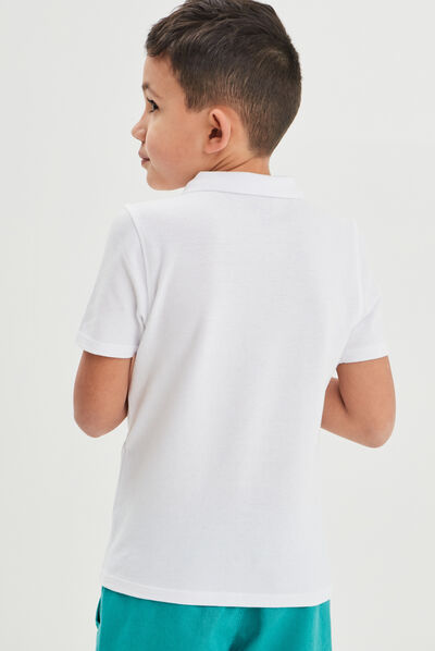 Polo manches courtes à détail brodé blanc garçon