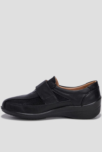 Loafers compensés en cuir noir femme