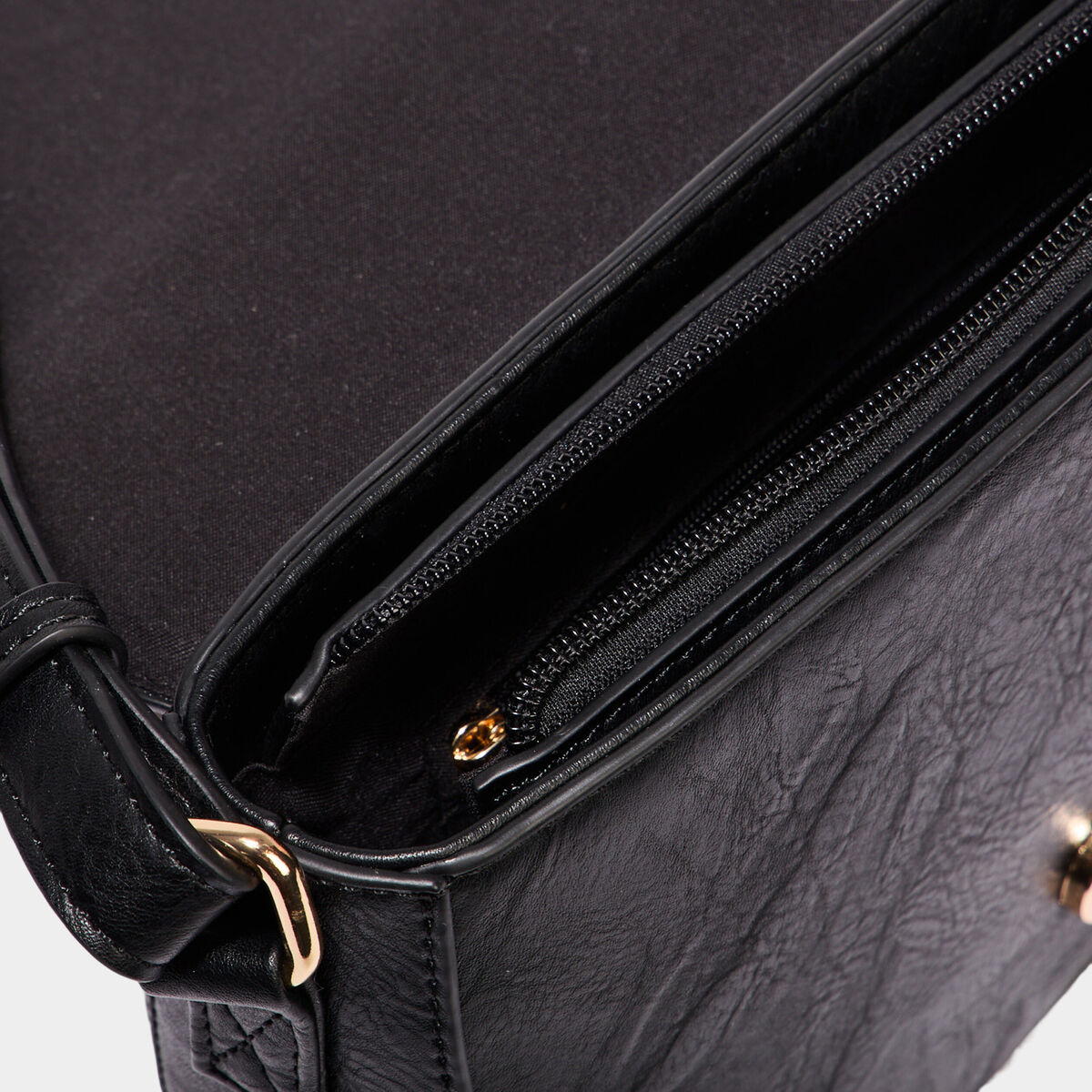 Sac besace avec clous noir femme