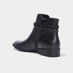 Bottines à talons plats détails cloutés noir femme