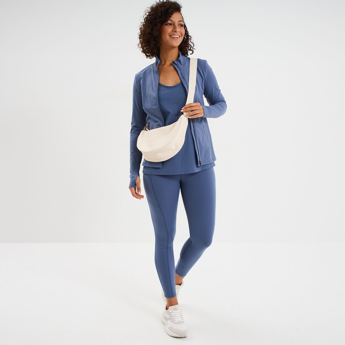 Veste de sport ajust&eacute;e avec fermeture bleu fonc&eacute; femme