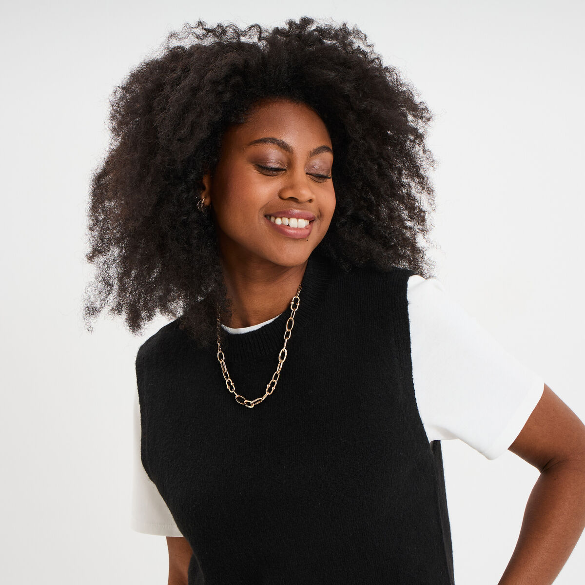 Pull sans manches col rond noir femme