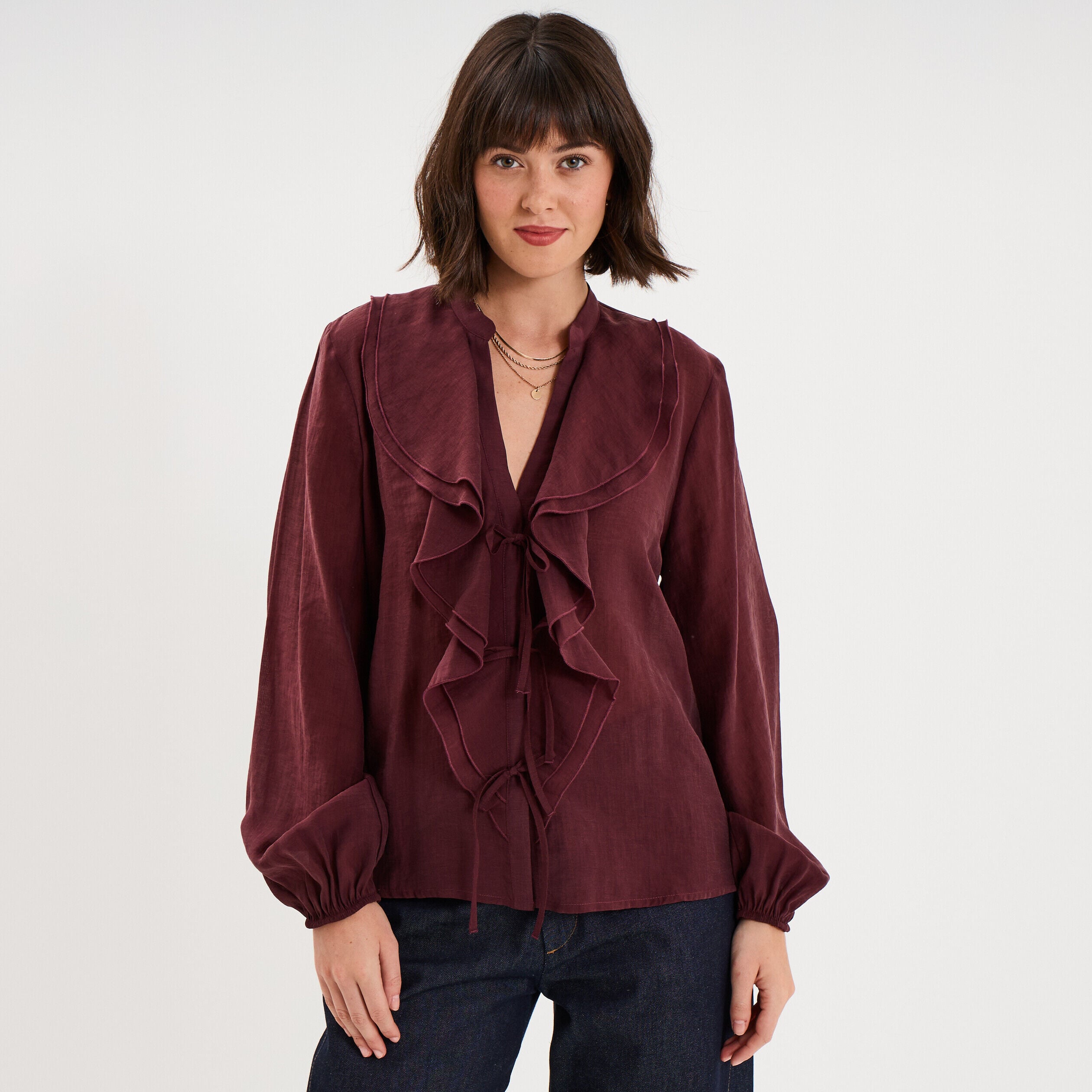 Blouse manches longues col V à volants violet foncé femme
