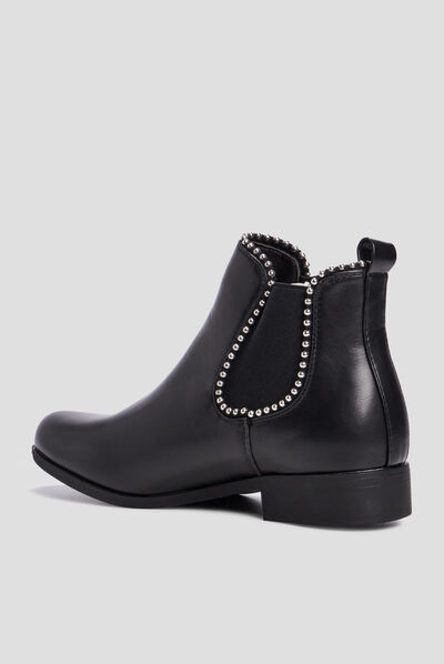 Bottines fourrées chelsea avec clous noir femme