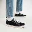 Tennis basses en toile &agrave; lacets noir homme