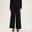 Pantalon large avec boucle noir femme