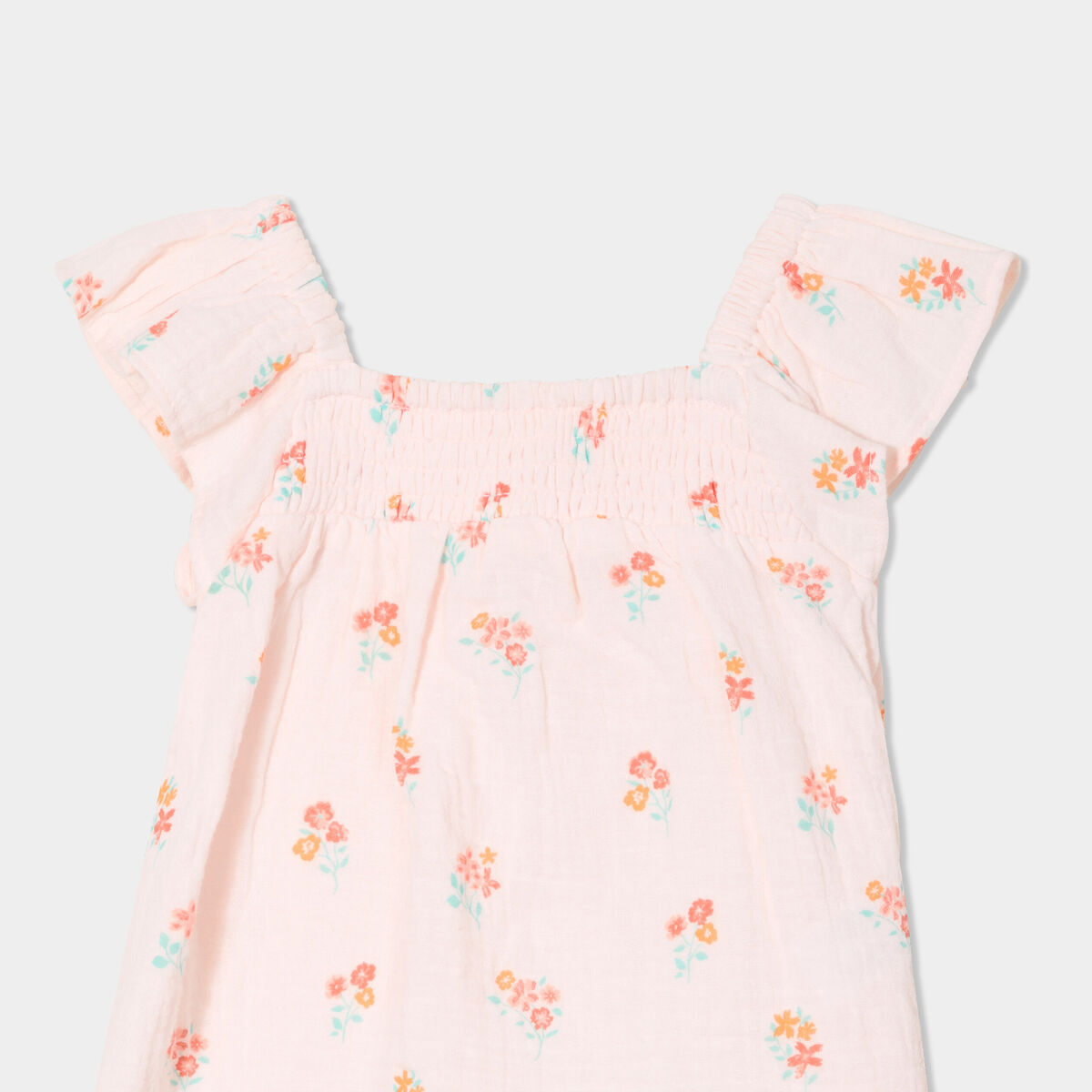 Blouse smockée à volants gaze de coton rose clair bébé fille