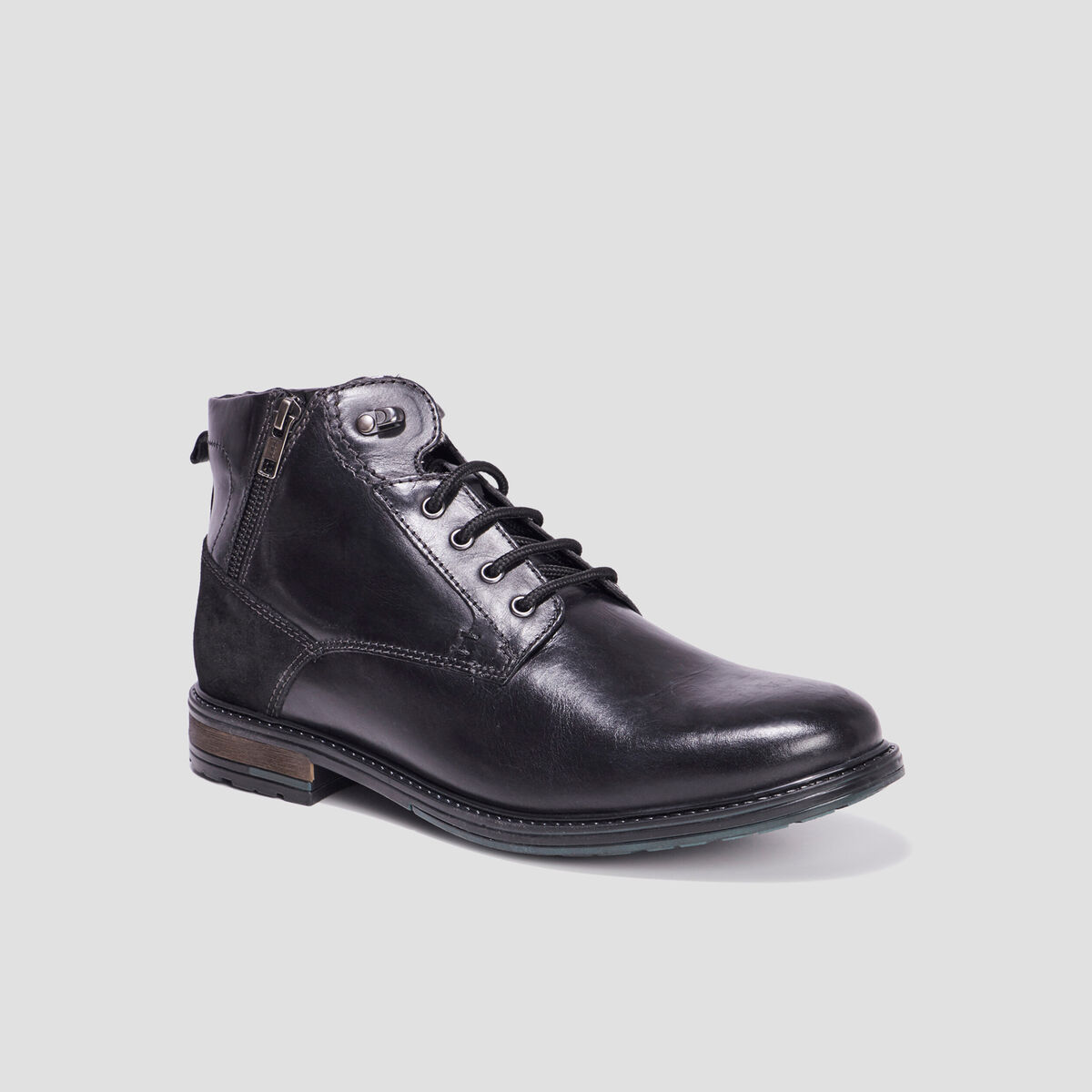 Boots zippées en cuir noir homme