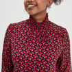 Blouse manches longues à col montant noir femme