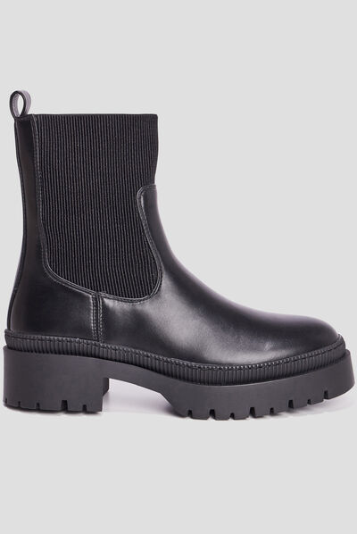 Bottines ranger crantées noir femme