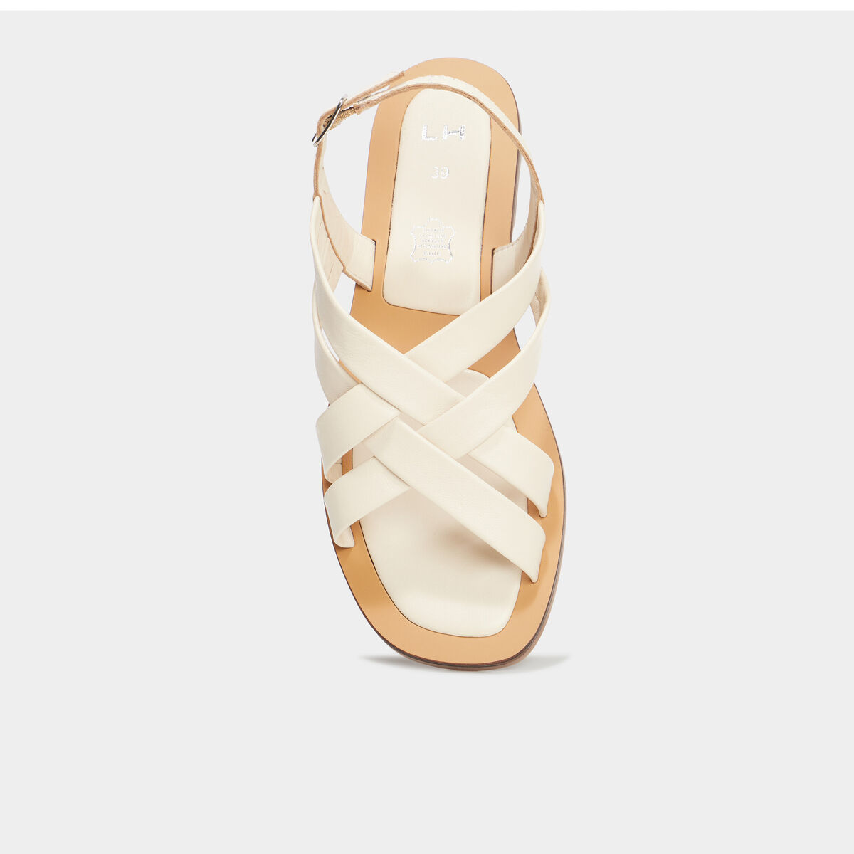 Sandales plates brides crois&eacute;es en cuir blanc femme