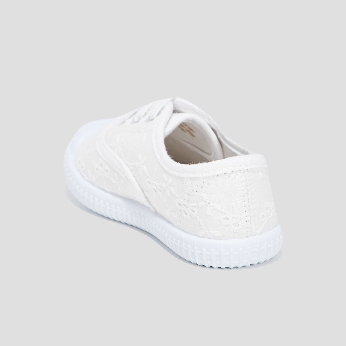 Tennis en toile avec bout renforc&eacute; blanc fille