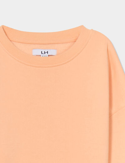 Sweat oversize manches longues col rond rose saumon garçon