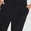 Pantalon évasé à pinces noir femme