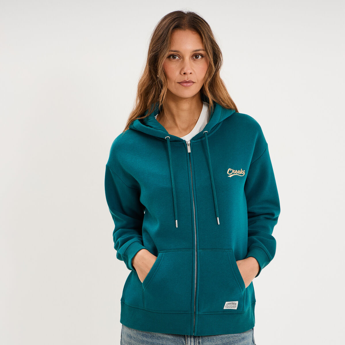 Sweat zipp&eacute; &agrave; capuche vert fonc&eacute; femme