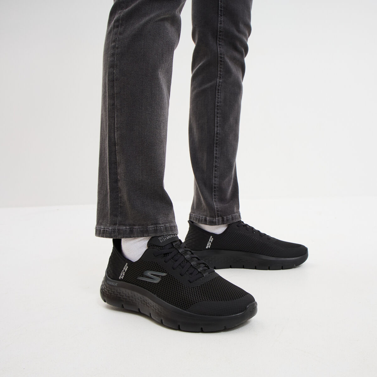 Baskets running lacets élastiqués noir femme