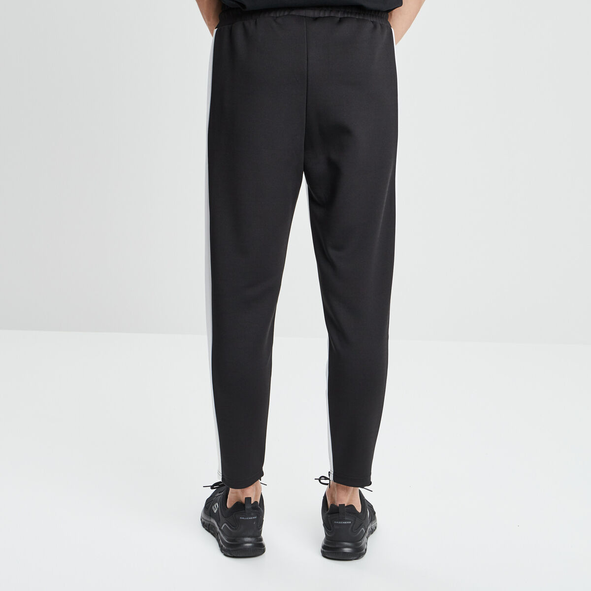Jogging ajusté détails zippés noir homme