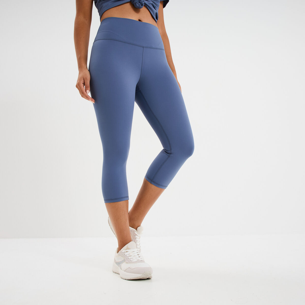 Legging corsaire de sport stretch bleu fonc&eacute; femme