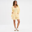Short large avec pinces jaune clair femme