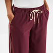 Pantalon fluide élastiqué bandes côtés violet foncé femme