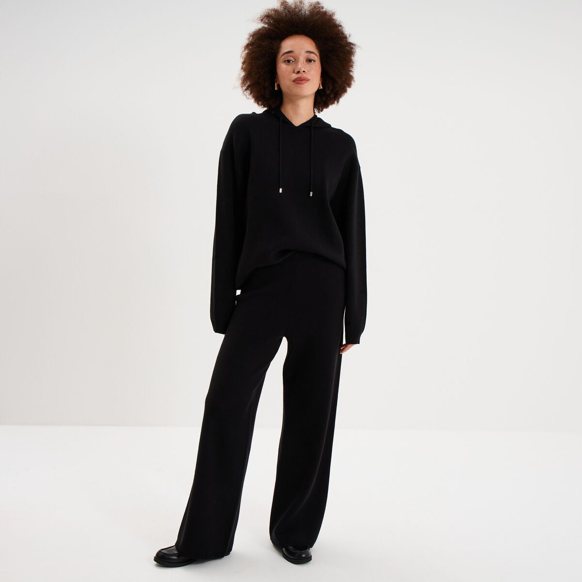 Pantalon large en maille cropped noir femme