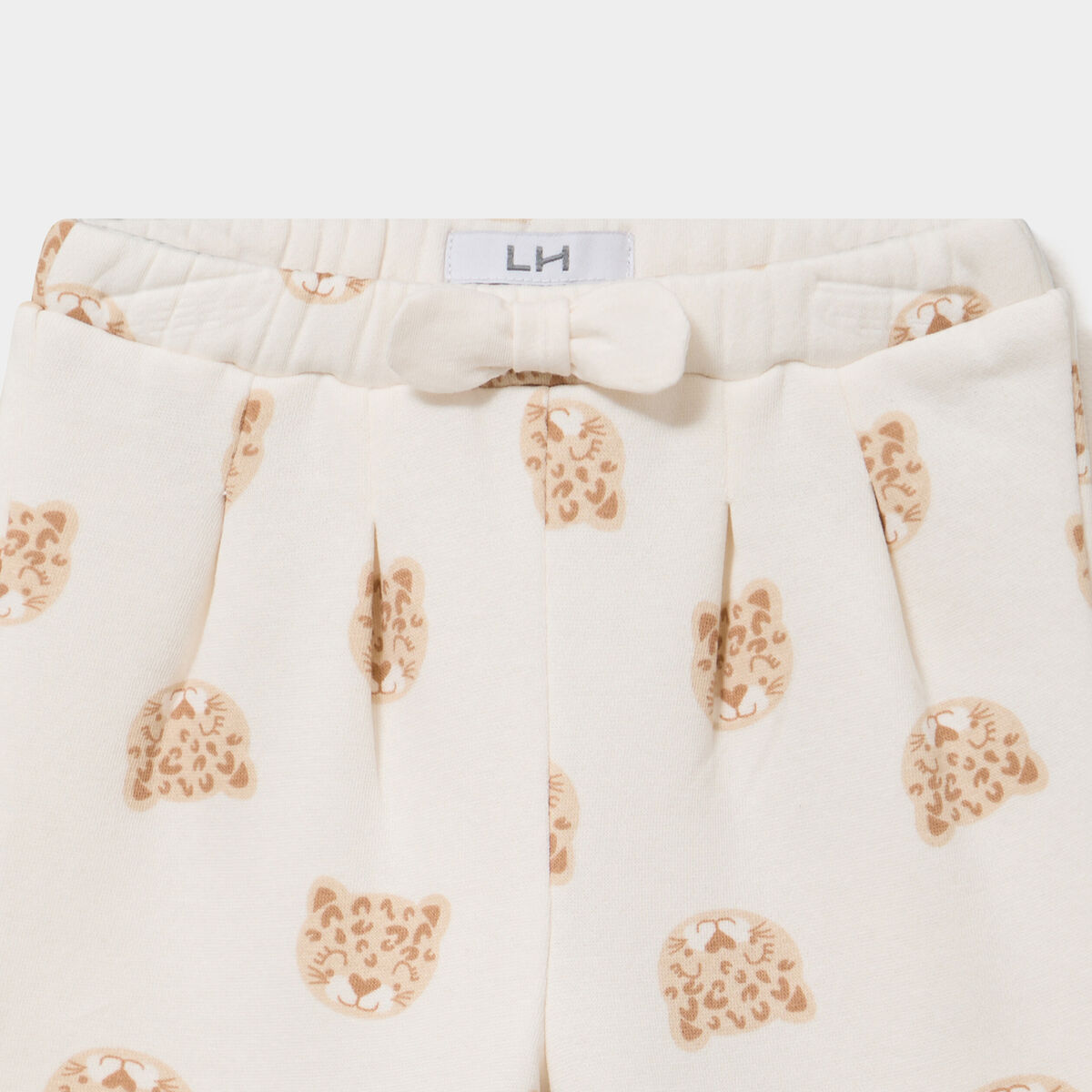 Pantalon de jogging molleton &agrave; noeud ecru b&eacute;b&eacute; fille