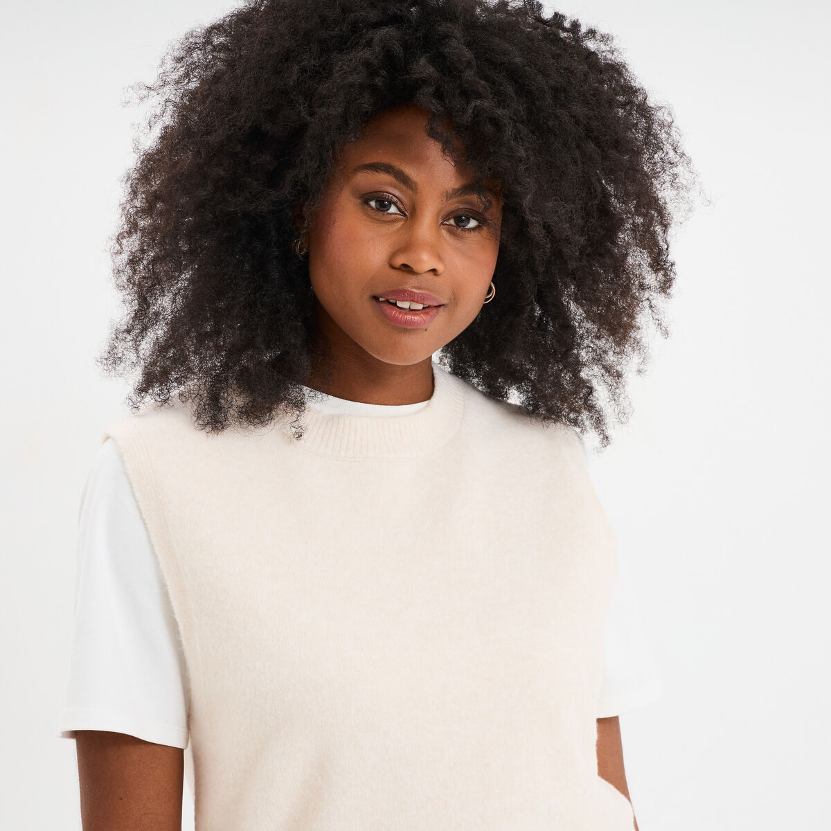 Pull sans manches col rond beige femme