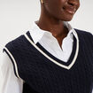 Pull sans manches col en V torsades bleu marine femme