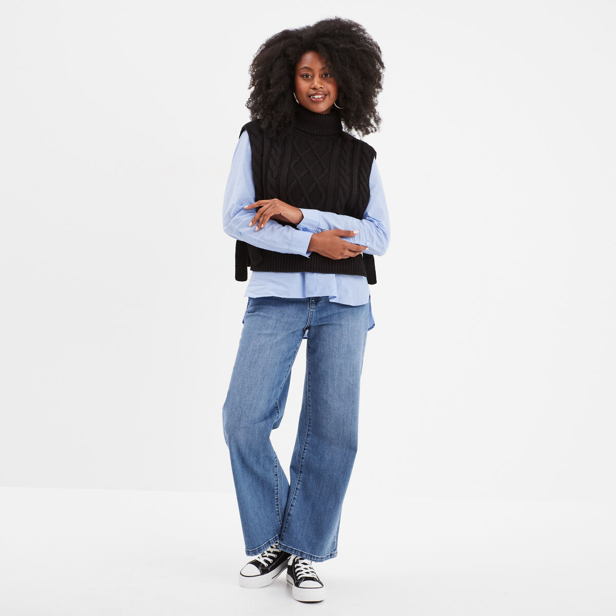 Pull gilet noeuds col roulé sans manches noir femme