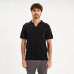 Polo manches courtes textur&eacute; coton noir homme