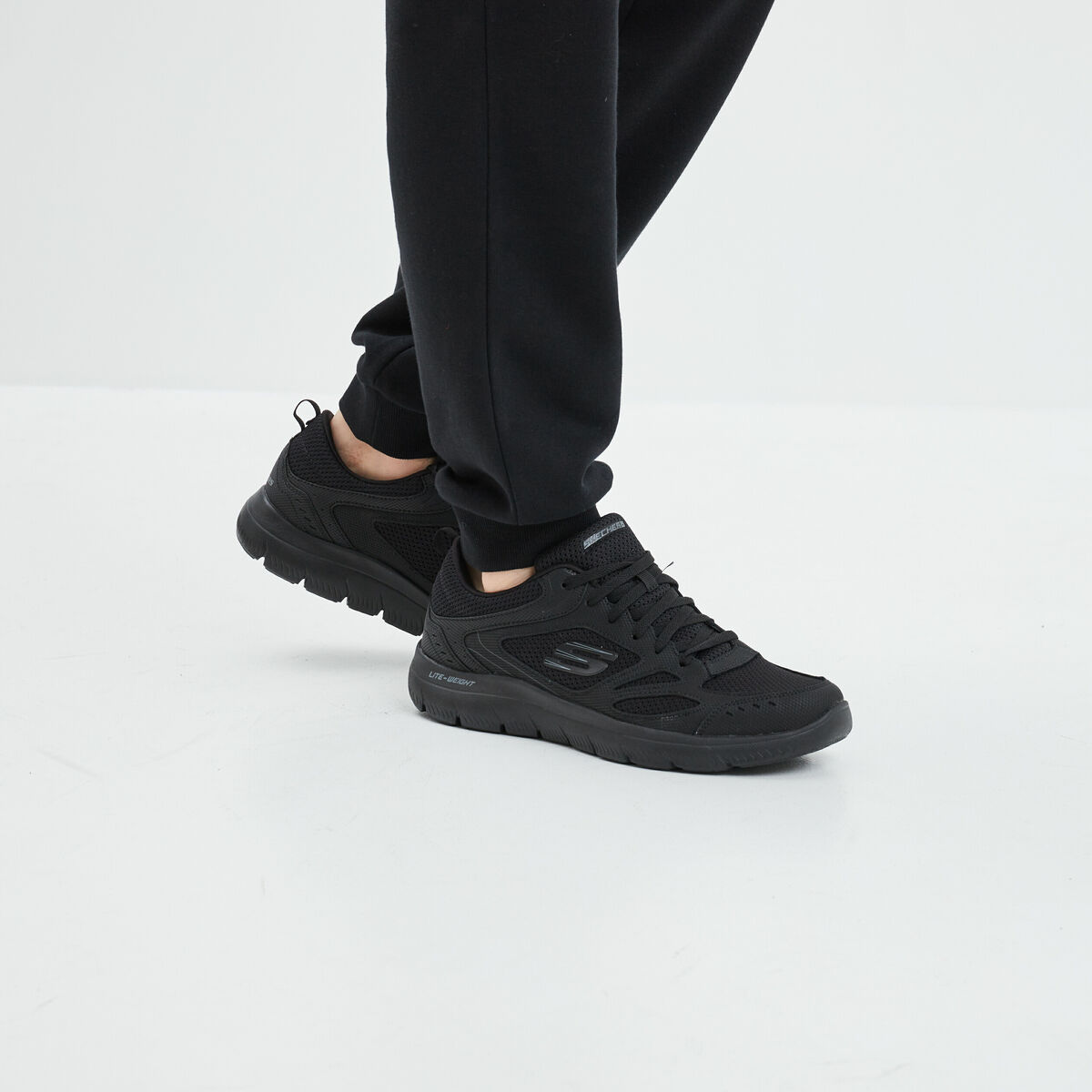 Baskets running mémoire forme Skechers noir homme