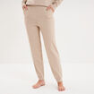Bas de pyjama jogger en maille beige femme