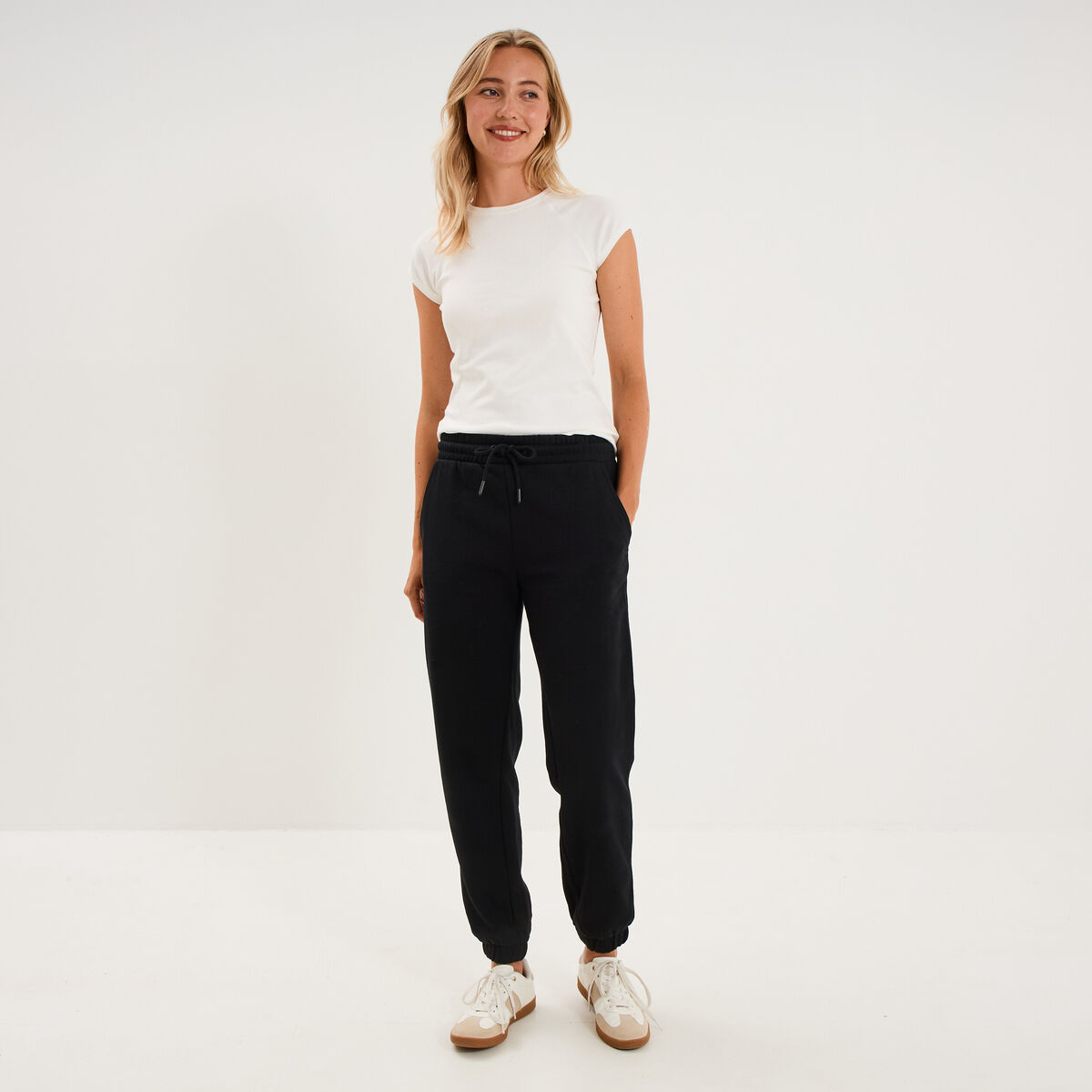 Pantalon de jogging molletonn&eacute; noir femme