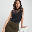 Blouse plumetis habillée sans manches noir femme