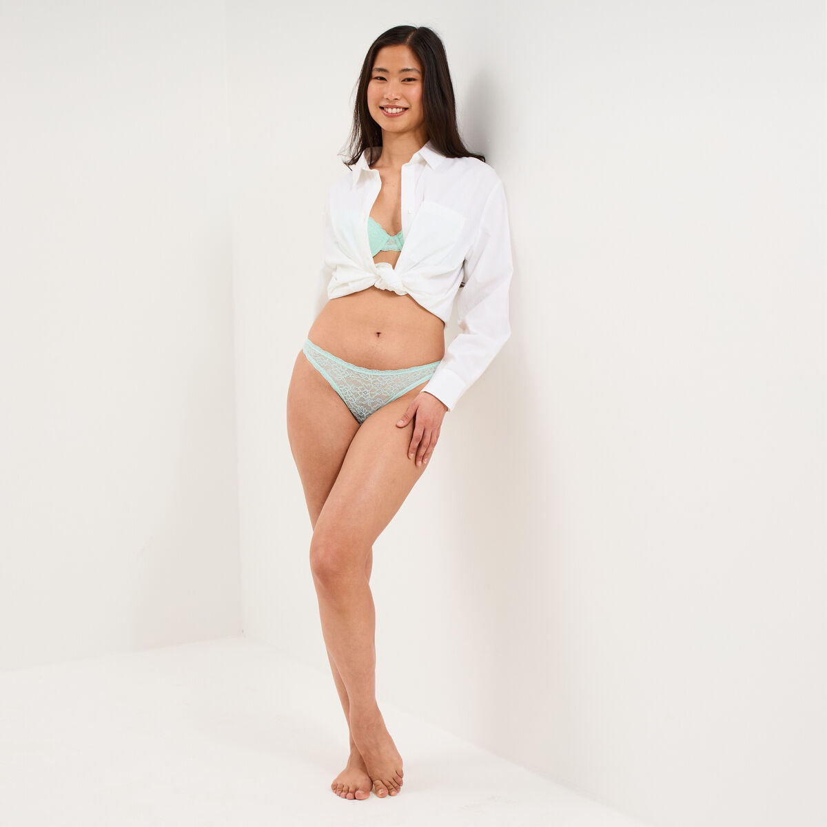 Tanga en dentelle doublure coton vert turquoise femme