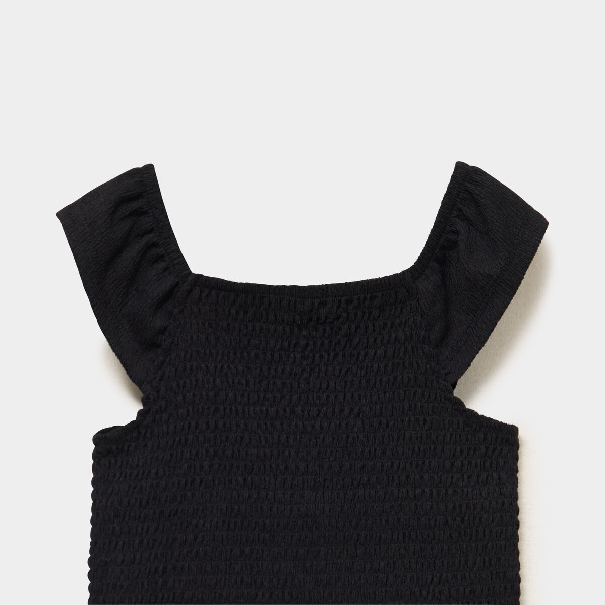 Blouse smock&eacute;e ajust&eacute;e avec volants noir fille