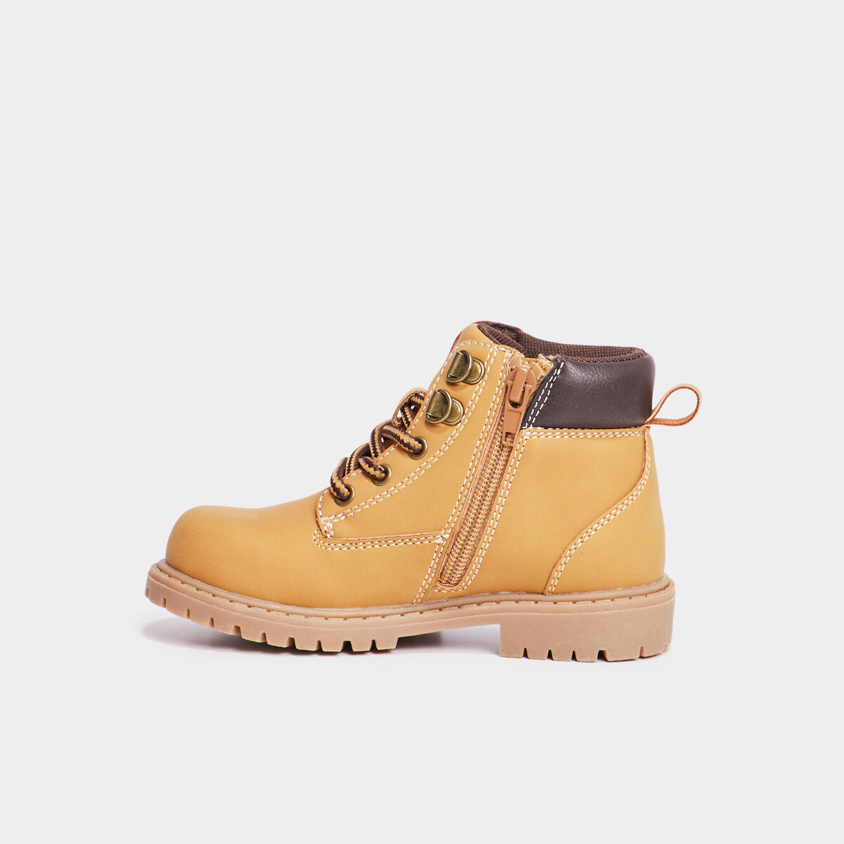 Boots crant&eacute;es zipp&eacute;es Trappeur jaune gar&ccedil;on