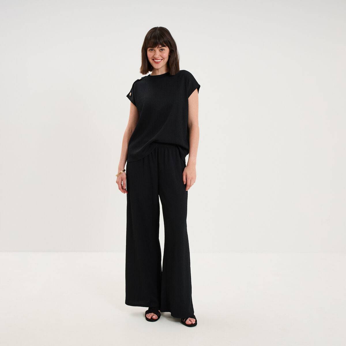 Pantalon effet gaufr&eacute; fluide noir femme
