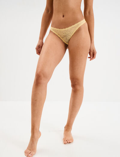 Tanga en dentelle doublure coton jaune clair femme