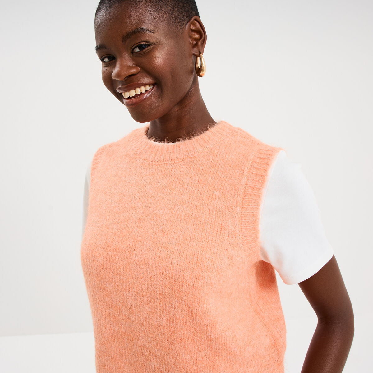 Pull sans manches col rond rose corail femme