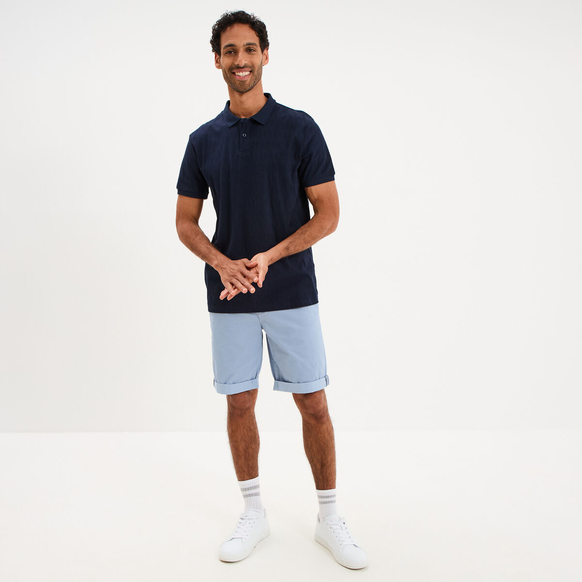 Polo textur&eacute; manches courtes bleu marine homme