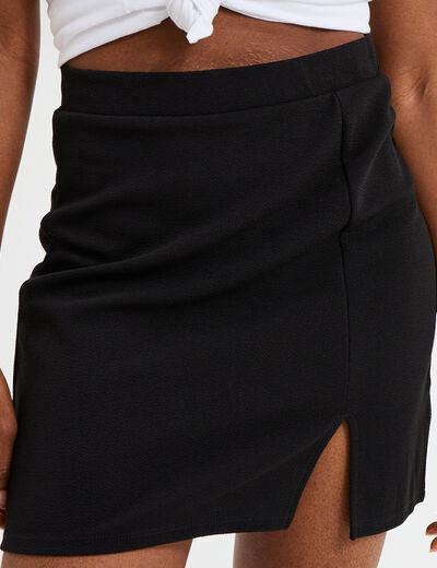 Jupe courte ajustée fendue noir femme