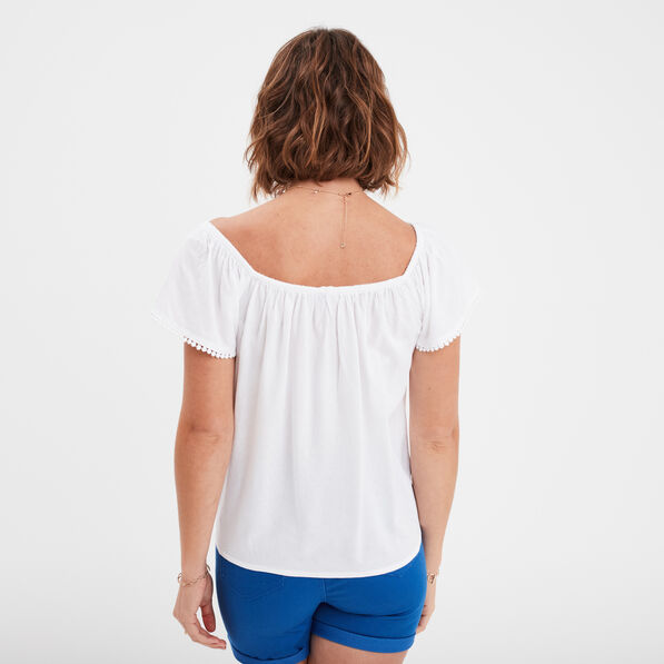 Blouse manches courtes avec noeud blanc femme